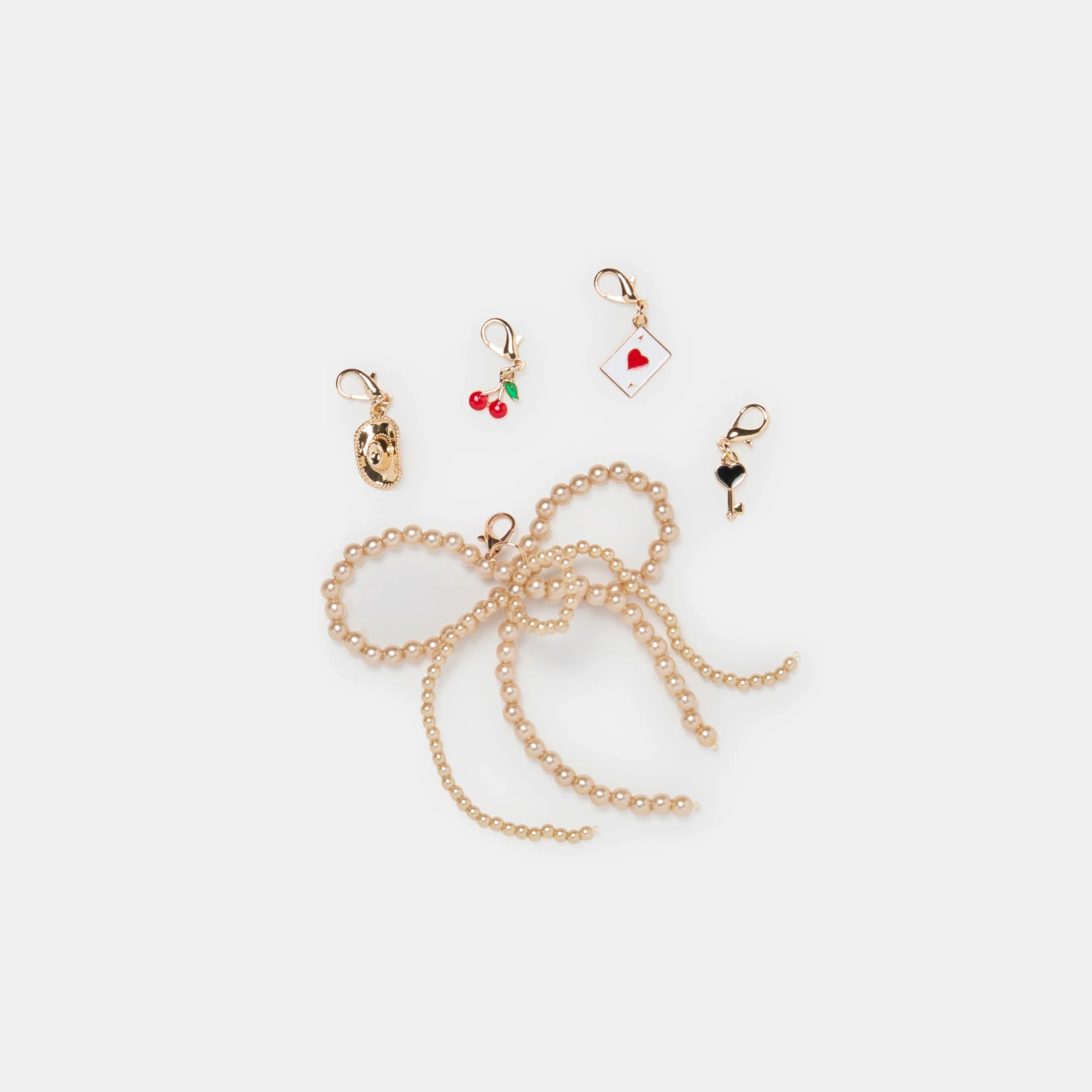 GOLD BOW CHARM PACKAGE CLEAR
